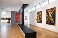 Installation view of Klaus Moje: Painting with Glass at the Museum of Arts and Design, New York…