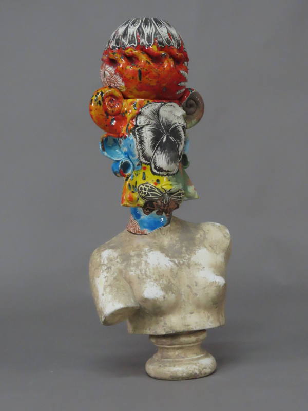 Floral vase on classical bust